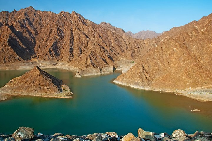 Experience the serene beauty of Hatta Dam surrounded by rugged mountains and peaceful waters perfect for a day of exploration and relaxation in the heart of Dubai's natural landscape.